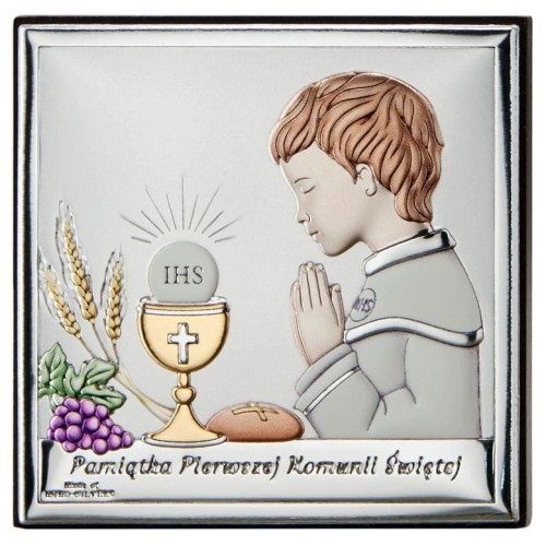 Srebrny obrazek komunijny z modlącym się chłopcem przy kielichu eucharystycznym.