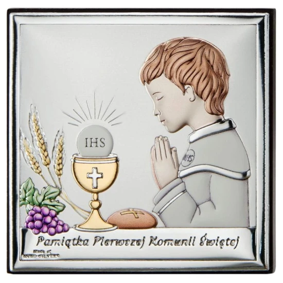 Srebrny obrazek komunijny z modlącym się chłopcem przy kielichu eucharystycznym.