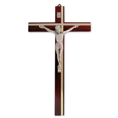 Krzyż drewniany inkrustowany metalem w kolorze złotym.