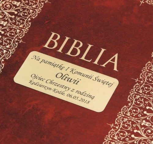 Twarda okładka z ornamentami i dedykacją komunijną