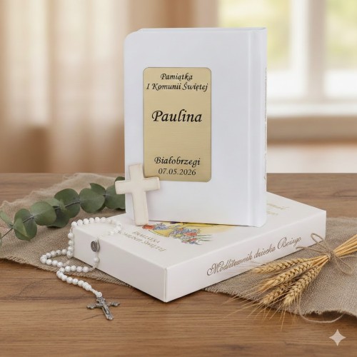 Grawerowana dedykacja na metalowej tabliczce.