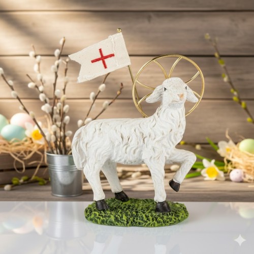 Starannie wykonana figurka z aureolą i metalowym detalem.