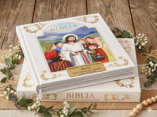 Elegancka Biblia komunijna w etui.