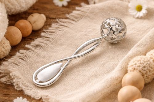 Grzechotka ze srebra próby 925.