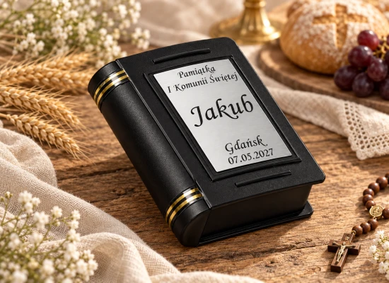 Pudełko ma formę niewielkiej książeczki ze złotymi paskami przy grzbiecie.